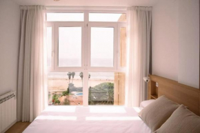 Luminoso estudio con vistas al mar